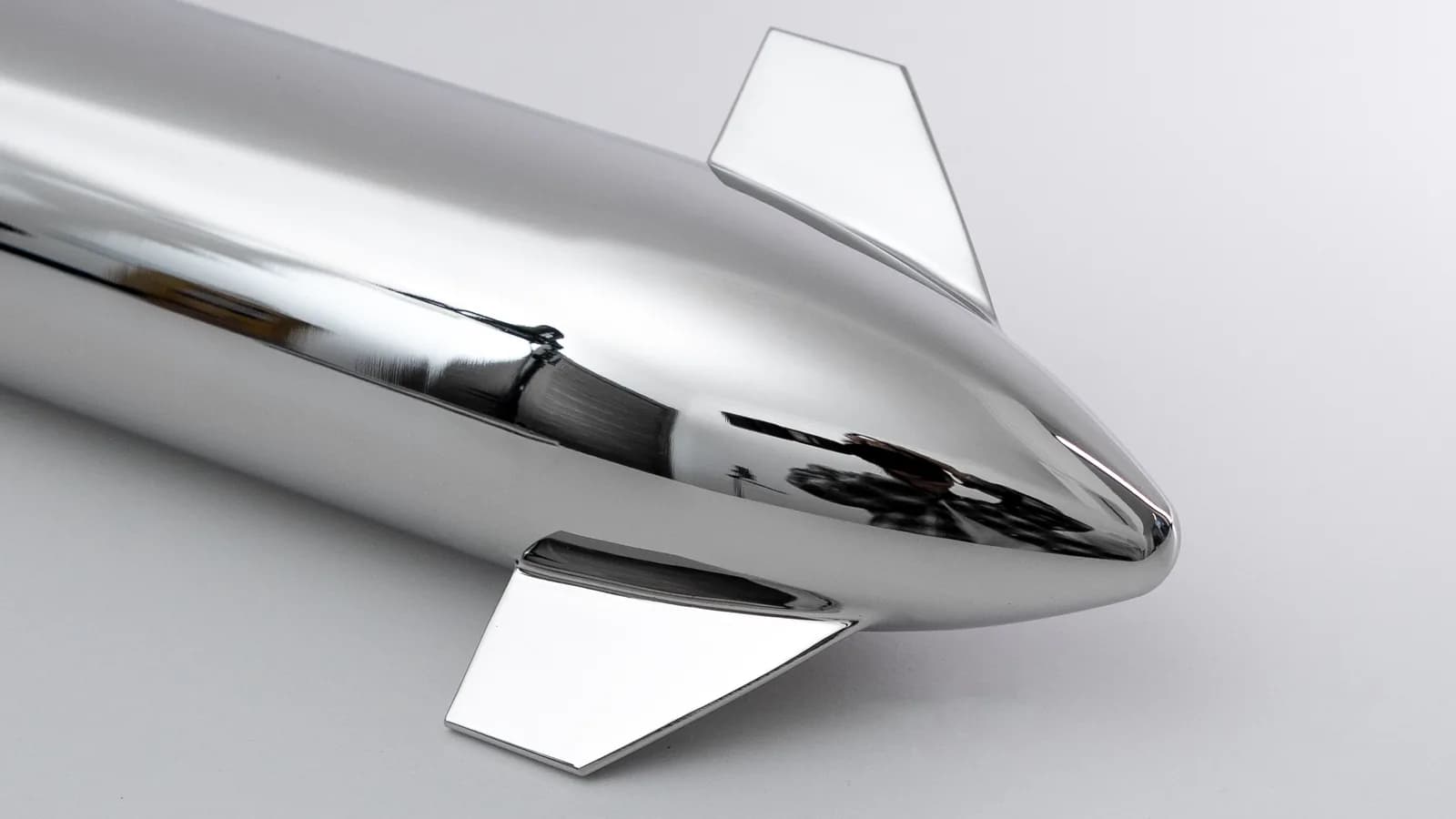 Mirror polished stainless steel detail showing the finish quality of a Vokar Studio object
